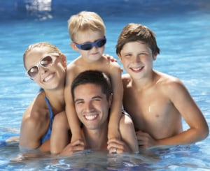 family in pool