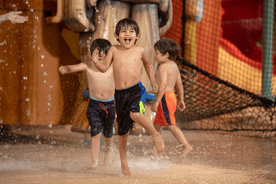 Photo of kids having fun in a pool